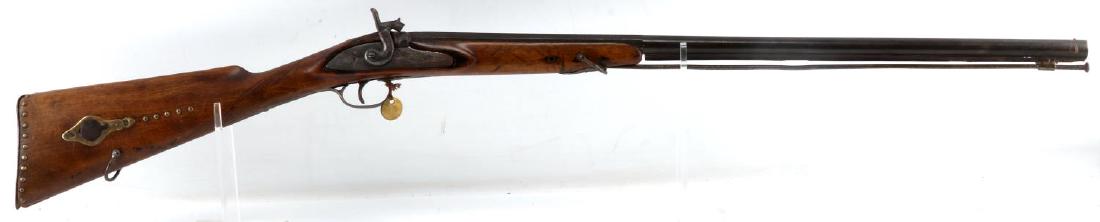 ANTIQUE PERCUSSION RIFLE WITH 17MM BORE: Light wood stock with brass buttons and patch box, 27 inch octagon to round barrel, oxidized clear bore, engraved design to lock plate, hammer is loose but action works. Ramrod present. Pitting to bar
