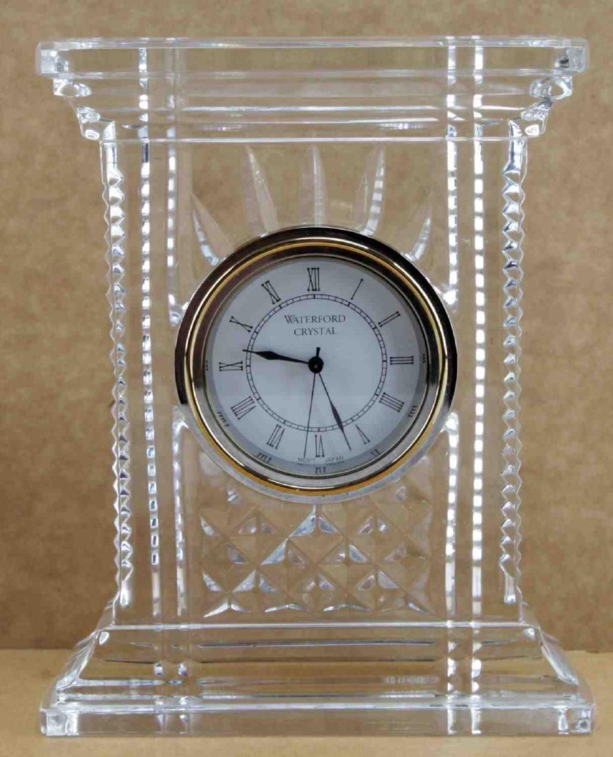 WATERFORD CRYSTAL DESK CLOCK: Fine Waterford Crystal. Very good conditon overall with some slight imperfections present. It measures 10" X tall just over 4" wide.
