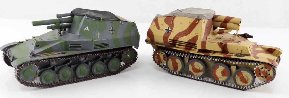 TWO WOOD & PAPER MODELS OF GERMAN WWII TANKS: Two wood and paper models of German WWII tanks. One blue and green. Written on the bottom "Germany Wespe self propelled 105 Howitzer 676 Built 2/1943-7/1944 1/24 Scale" Signed "1984 M.E.D" Measures 8 