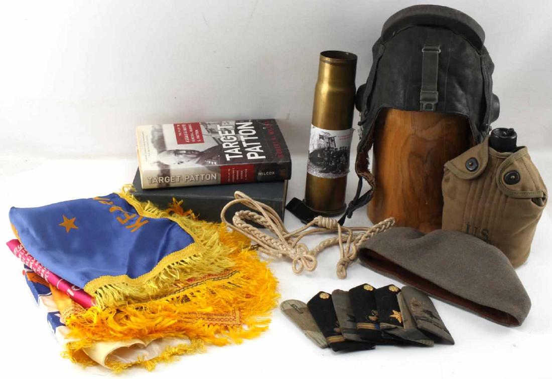 US MILITARY MIXED LOT BOOKS SHELL SHOULDER BOARDS: Lot includes: 4 sweetheart pillow covers, shell from 5.7cm German tank gun, canteen wool cap, shoulder boards, cap insignia, Target: Patton by Robert K. Wilcox, Bismarck by Emil Ludwig and a flyer's c