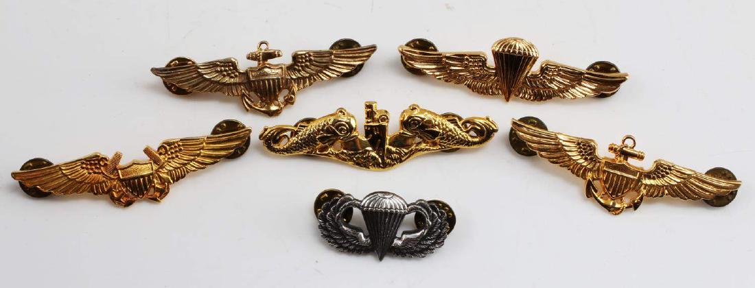 WWII US MILITARY AVIATOR PARATROOPER SUB BADGE LOT: Lot contains six badges Includes three Naval Aviator badges, a Navy & Marine Corps parachutist badge, an Army parachutist badge, and a submariner badge. All are in very good condition.