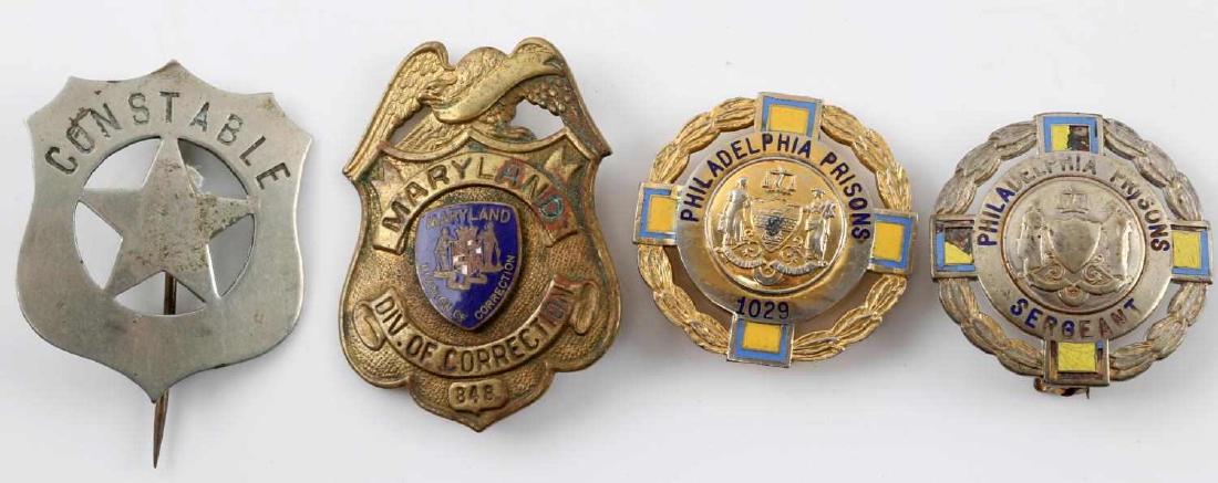 LOT OF 4 ANTIQUE CORRECTIONS & CONSTABLE BADGES: Lot of 4 Antique corrections & constable badges. Includes : 5-pointed star inside of shield Constable badge, 2 badges for Philadelphia Prisons 1029 & Seargant, Maryland Div of Correction. Items are in