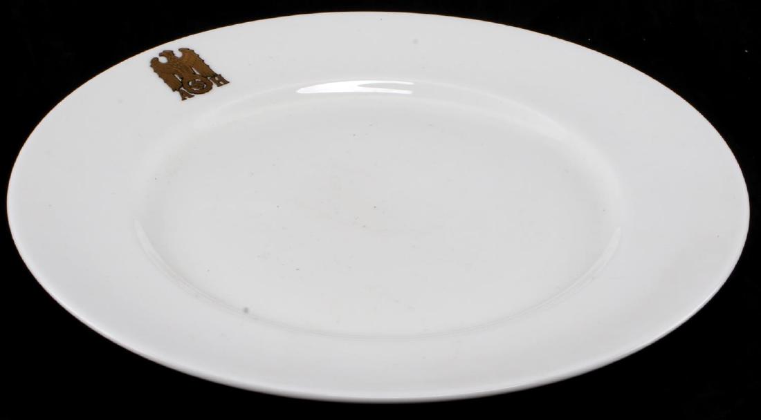 GERMAN THIRD REICH HITLER ALLACH PORCELAIN SAUCER: Porcelain plate with the gold 'AH' maker mark of Hitler's formal set. Has Allach maker mark on the bottom. Brought to the US by a member of the 506th PIR. Measures 8 - 1/8 inches in diameter. In very 