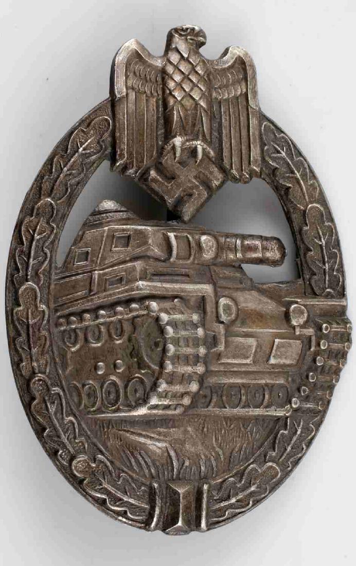 WWII GERMAN THIRD REICH PANZER ASSAULT BADGE: German Panzer Assault badge. Reichsadler/swastika over Panzer tank within oak wreath. Thin vertical pin back version; stamped nickel construction. Unauthenticated; sold as is.