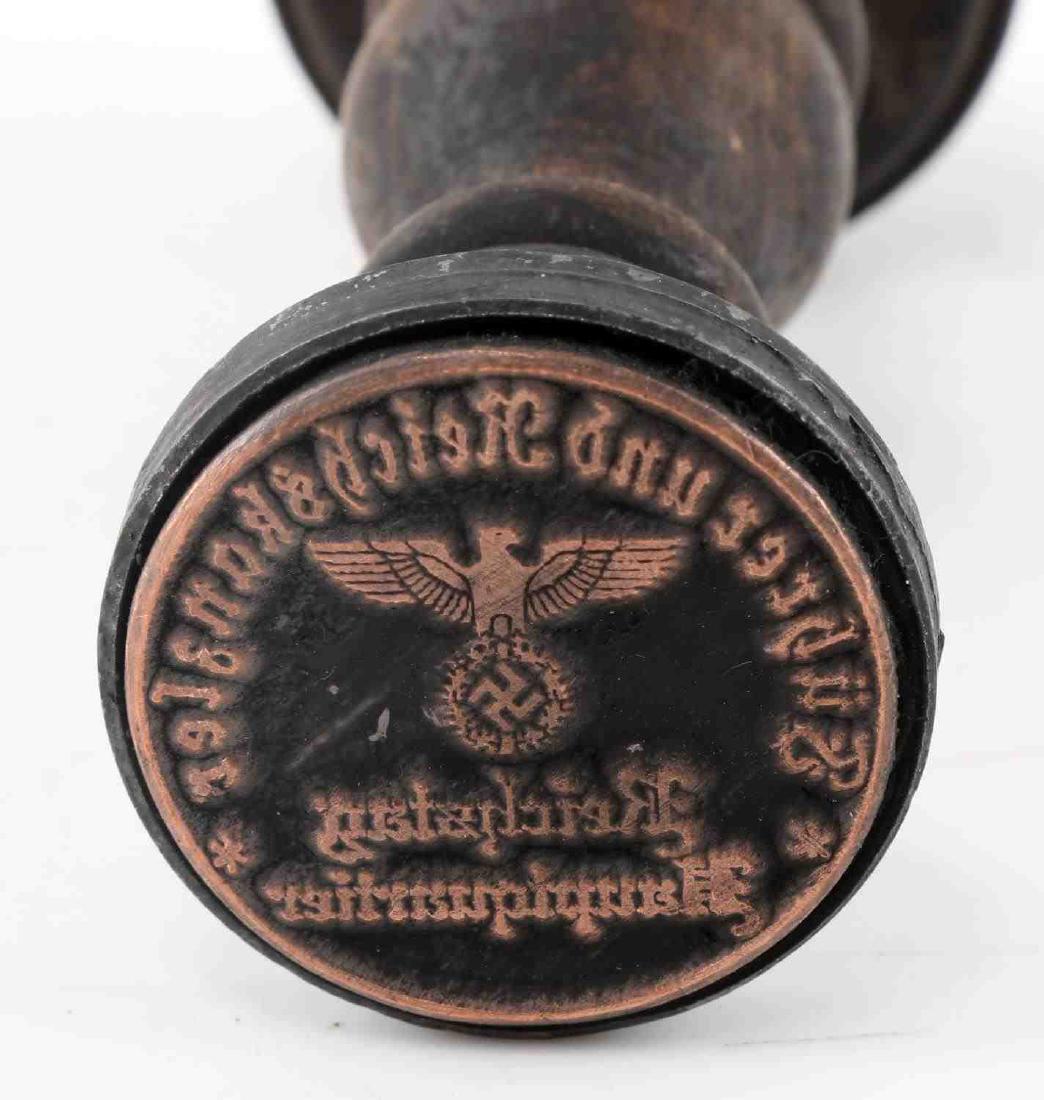 GERMAN WWII THIRD REICH ADOLPH HITLER HAND STAMP: German WWII Third Reich Adolph Hitler Hand Stamp. Measures about 4 1/2 inches tall. Stamp reads "Fuhrer Und Reichskanzler". Very good condition. Unauthenticated. Sold "As Is". This item has a reserve.