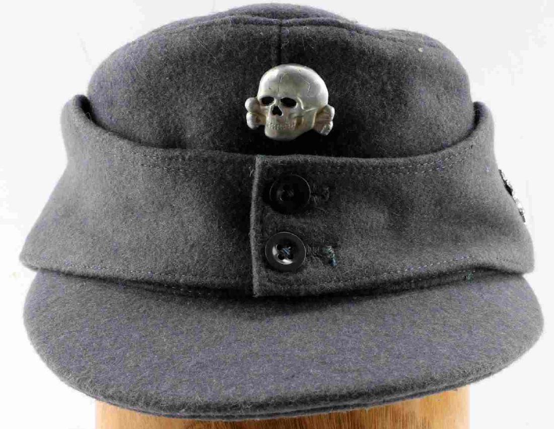 GERMAN WWII THIRD REICH SS MOUNTAIN TROOPS CAP: German WWII Third Reich Waffen SS Mountain Troops M43 Cap. Grey felt construction with tan cotton lining. Includes Visor Skull and Edelweiss pins. Very good condition. Unauthenticated. Sold "As Is". T