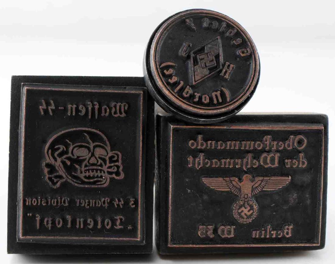 WWII GERMAN THIRD REICH NSDAP WOOD HAND STAMP LOT: Three hand stamps of the Third Reich, including Waffen-SS Panzer Division 'Totenkopf', Hitler Youth, and Wehrmacht Oberkommando. In very good condition overall. This item has a reserve.