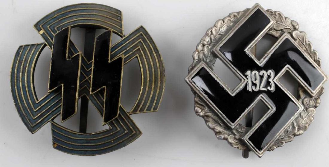 GERMAN WWII THIRD REICH ENAMELED BADGE SET: German WWII Third Reich Enameled Badge set of two. Includes SS Proficiency badge and 1923 Party District Gau badge. Each Measures 1 3/4 inches in diameter. Very good condition. Unauthenticated. Sold "