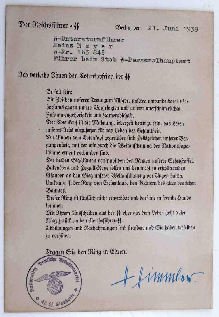 WWII GERMAN THIRD REICH SS HONOR RING CITATION: Citation for an SS Honor Ring. Includes printed signature of Heinrich Himmler. Unauthenticated/Sold 'as is' This item has a reserve.