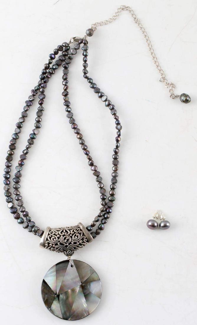 CULTURED FRESHWATER PEARL AND ABALONE NECKLACE: Cultured Freshwater Pearl Necklace with Abalone Pendant and Silver Bezel. Clasp is silver marked "925". Includes set of Freshwater Pearl Earrings. Very good condition.