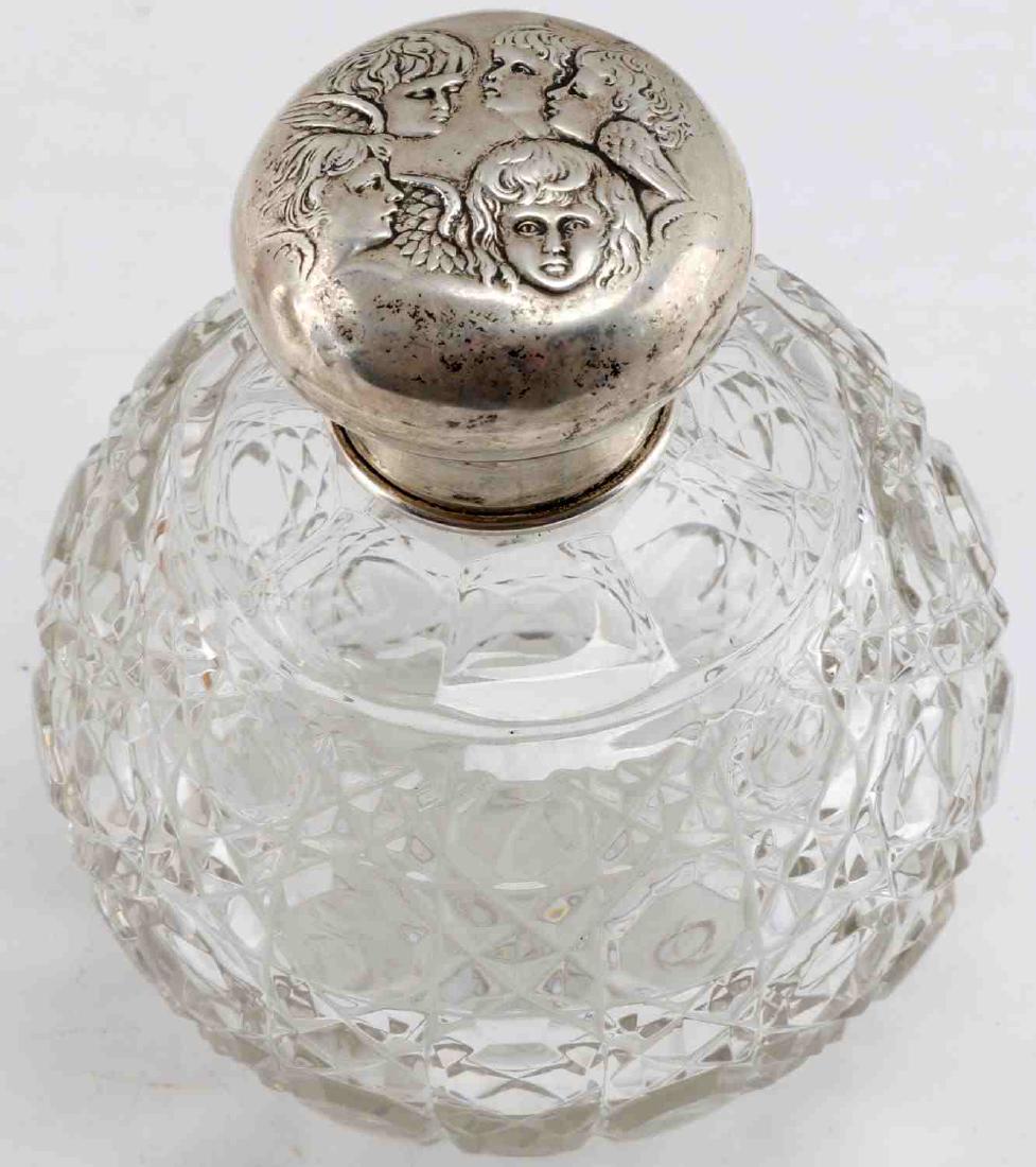 HALMARK STERLING CAP CRYSTAL PERFUME BOTTLE 1908: Engraved Sterling Cap Crystal Decanter bottle for either liquor or other precious liquids such as fragrances and perfume. The top of the sterling silver cap is artfully crafted and engraved with highl