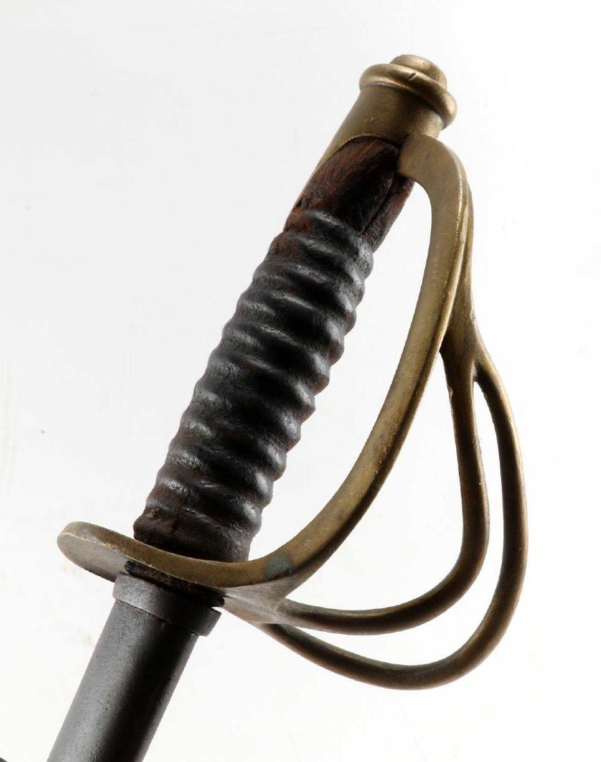 AMERICAN CIVIL WAR MODEL 1860 LIGHT CAVALRY SABER: Model 1860 Light Cavalry Saber. Leather cover and wire wrapping on the hilt are missing. Blade is marked 'US JCW 1864' on one side and Mansfield & Lamb maker mark on the other.