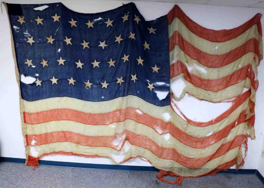 AMERICAN CIVIL WAR 34 STAR LARGE SIZE FLAG: 34 Star United States flag believed to date from the early Civil War period. Measures about 90 inches at the hoist. Measuring the length is difficult as the fly is more tattered. Has multiple holes of