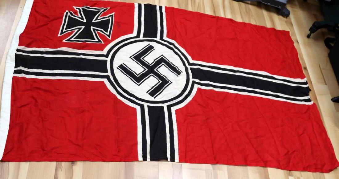 WWII GERMAN THIRD REICH WEHRMACHT KRIEGSFLAGGE: Wehrmacht war ensign or Kriegsflagge. Measures 58 inches long by 36 inches. Reinforced hoist with rope eyelets. In very good condition. Does not fluoresce under blacklight.
