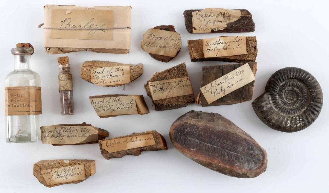 ANTIQUE HOLY LAND SOUVENIRS WOOD BOTTLE: Each piece is labeled as to the type of wood, the bottle has a old label "from River Jordan", even some fossils, interesting group.