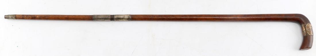 ANTIQUE 19TH CENT CURVED HANDLE WALKING CANE 925: Antique 19th Century Walking cane with top locket and central shaft locket made of sterling silver (tested). Silver Locket on handle is monogrammed with the words "W.A.E" middle of the shaft has anoth
