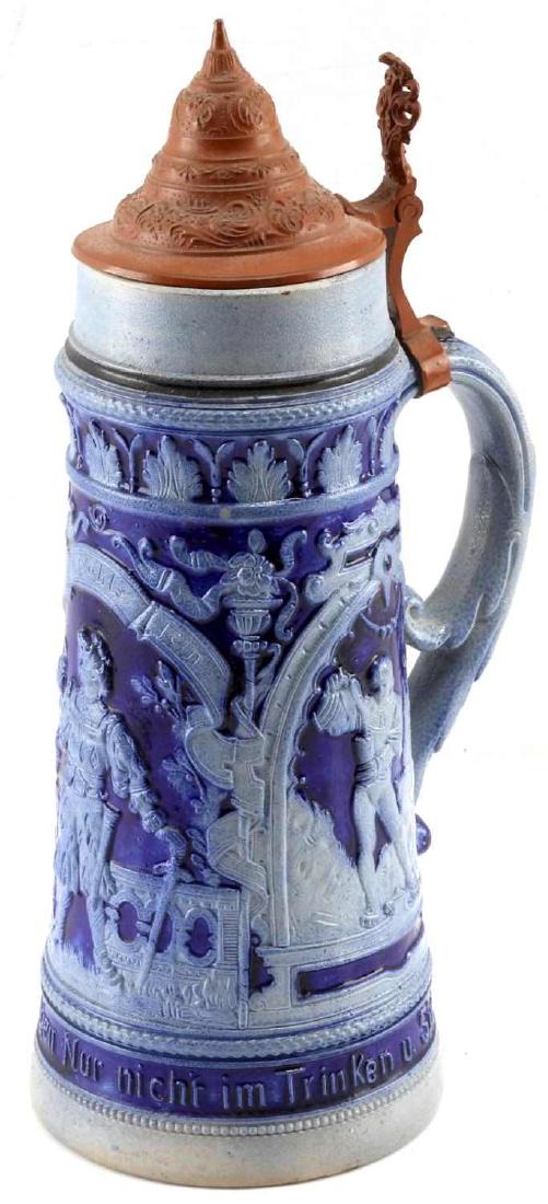 ANTIQUE TRADITIONAL COPPER TOP GERMAN BEER STEIN: Antique Traditional Copper top German Beer stein in traditional delft style with the engraving "Halfe Maas in allen Dingen Nur n\nicht im trinkewn u. singen" an old German drinking proverb or saying. 
