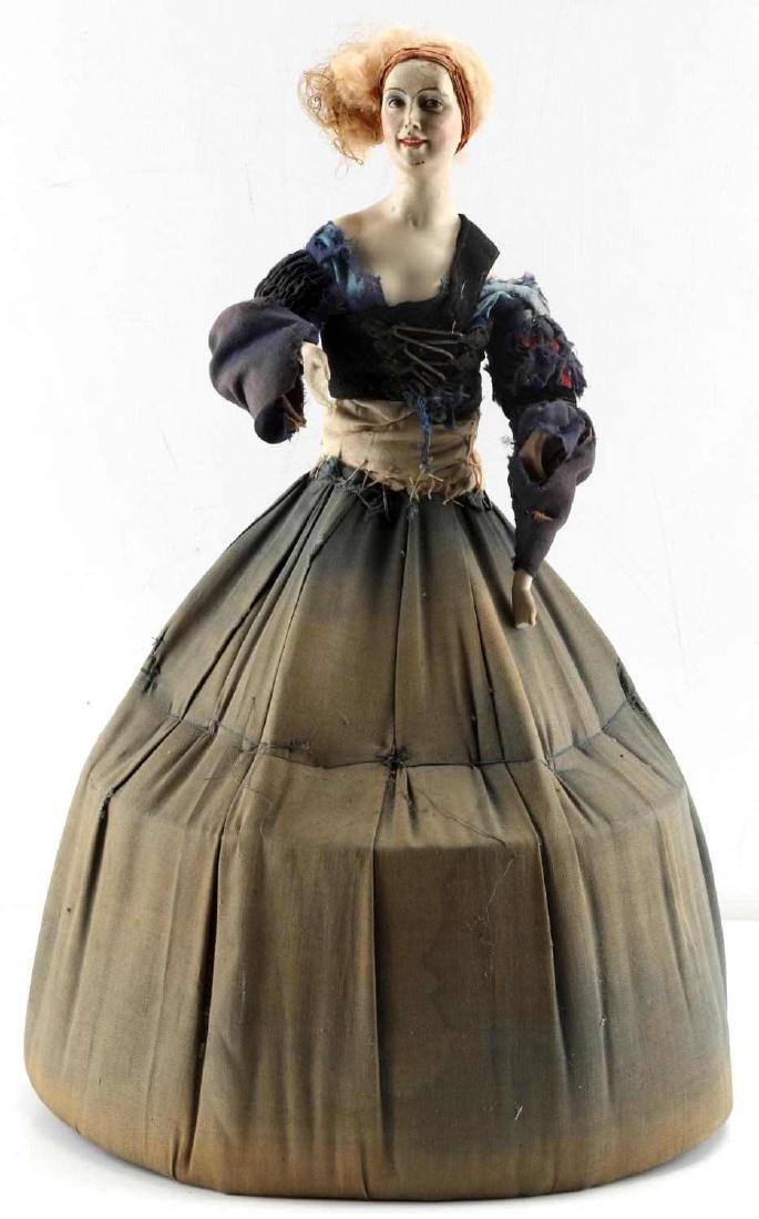 ANTIQUE LILE BAITZ HALF DOLL LORE: Back of head is signed "Lore" Baitz, one hand is complete other is damaged, hair loss to head but otherwise complete, clothing is worn but original she stands 19 inches. G3