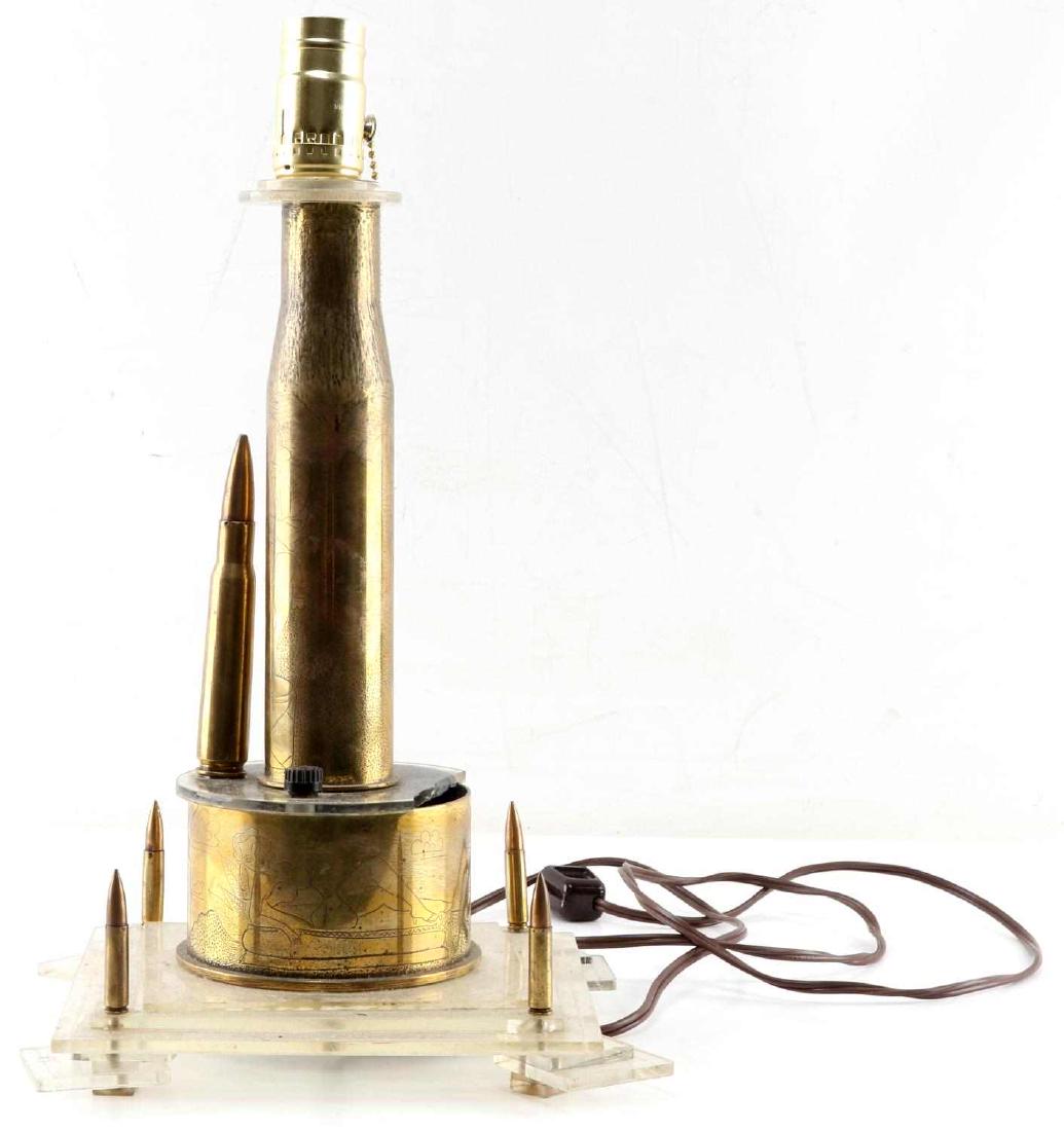 WWII TRENCH ART NUDE PIN UP DESIGN LAMP: Nudes galore on this multi shell and bullet lamp, wired to work but not tested, measures 15 inches, the lucite base has federal eagles etched into it.