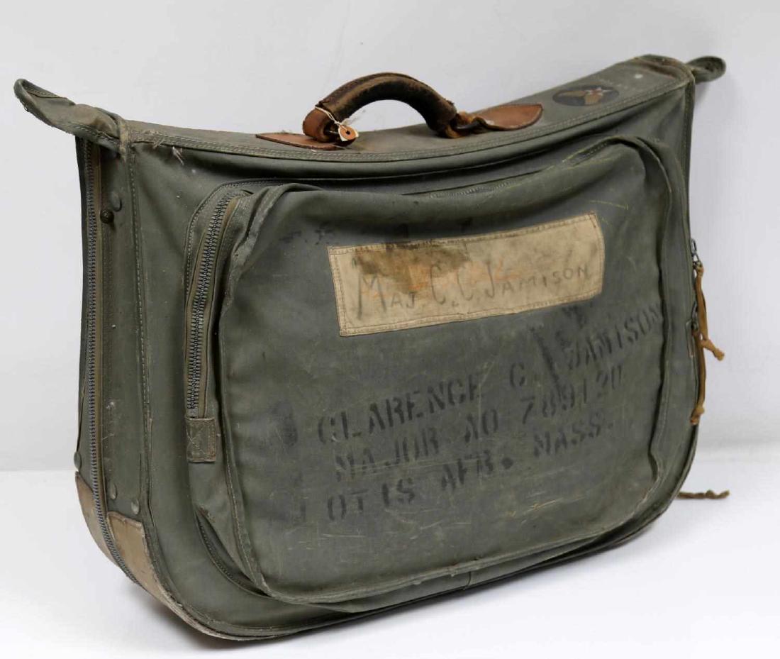 US AIR FORCE 1950S KOREAN WAR DUFFLE TOTE BAG: 1950s US Air Force stenciled duffle bag. The name "Maj. Clarence C. Jamison" is stenciled on the bag along with "72 72nd Ad Wing" and "APO 23B New York" This name corresponds with a member of the Tusk