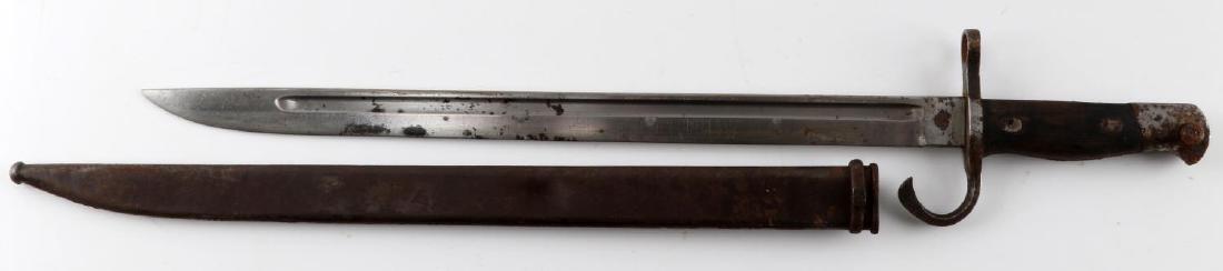 WWII JAPANESE ARISAKA BAYONET KOKURA TOKYO ARSENAL: WWII Imperial Japanese bayonet for Arisaka Complete with original scabbard, 3-circle marking on ricasso denoting the Tokyo (Kokura) Arsenal is prominent and blade is in good condition for its age, sca