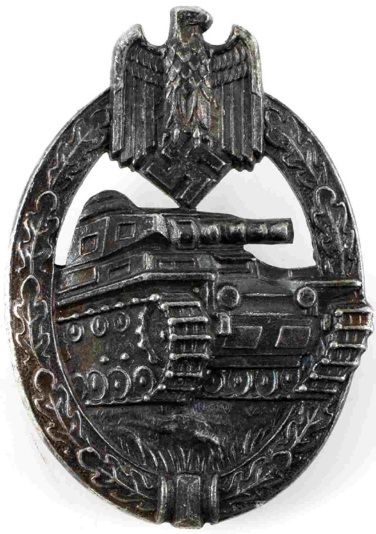 WWII GERMAN THIRD REICH PANZER TANK ASSAULT BADGE: German Panzer Assault badge. Solid type; thin vertical pin back. Reverse marked AS within triangle for Adolf Scholze. Pin catch is slightly bent. Some detail loss and patina present. Good condition ov