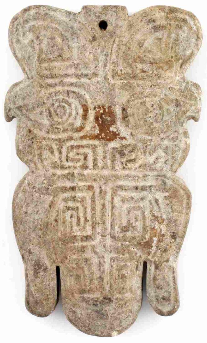 HAND CARVED STONE PENDANT ZOOMORPHIC W EYES: Carved design with eyes set at middle, hole for hanging, measures 5 inches long.