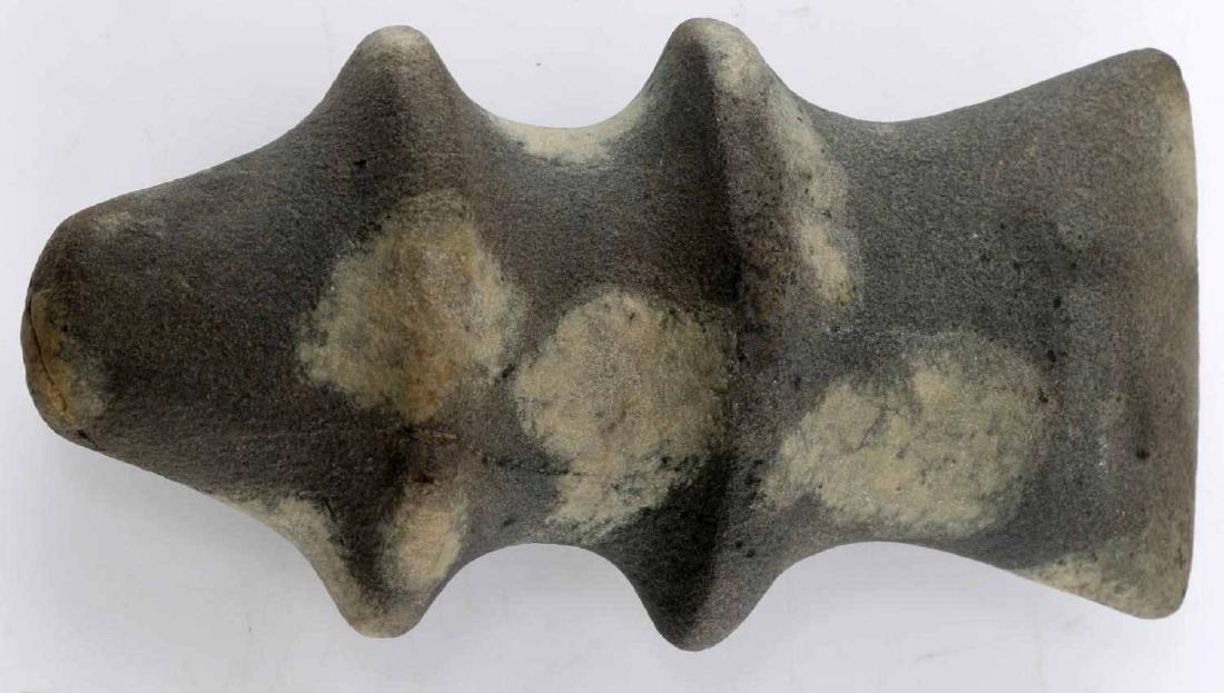 WOODLAND PERIOD NATIVE AMERICAN FULL GROOVED AXE: Woodland period full grooved axe. Carved out of mottled gray stone. In very good condition. Measures 6 inches by 3 inches.