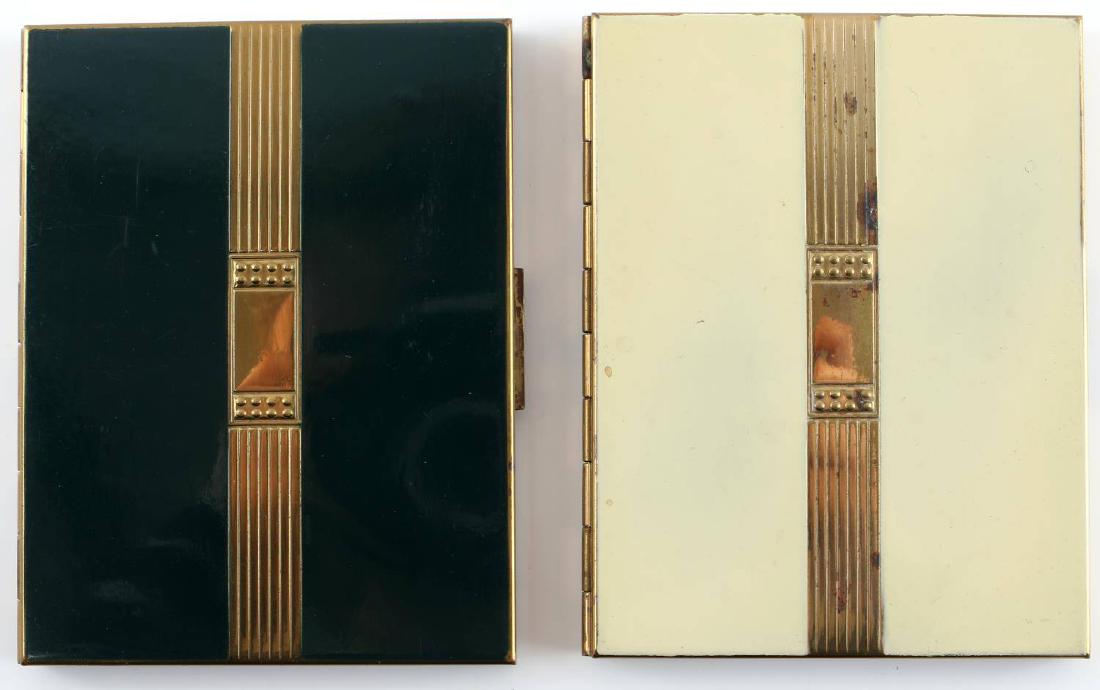 2 VINTAGE SALON ROYAL COMPACT POWDER CASES: One green with gold, one cream with gold, contains: brush, pencil, pad and two closed compartments. Both in good used condition. Measures 4 X 3 inches.
