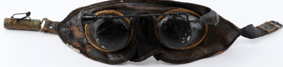 ANTIQUE 19TH CENTURY MASONIC HOODWINK GOGGLES: Good condition for the age, missing part of the strap otherwise complete.