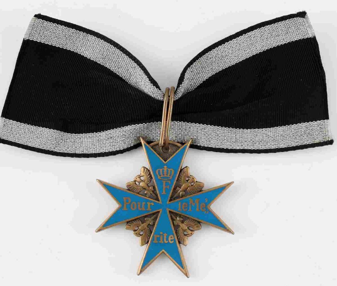 IMPERIAL GERMAN WWI PRUSSIAN BLUE MAX NECKLET: Prussian Pour Le Merite or Blue Max neck order. Measures 2 inches square. Includes part of the presentation ribbon. In very good condition. Unauthenticated/Sold 'as is'