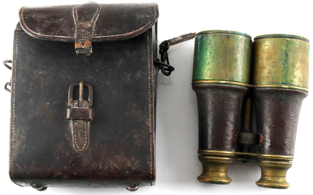 AMERICAN CIVIL WAR FIELD GLASSES BINOCULARS: Brass and leather construction marked "Michael Rupp & CO New-York on the eye pieces. Very good working condition with original leather carrying case. Some wear and discoloration present. Straps on cas