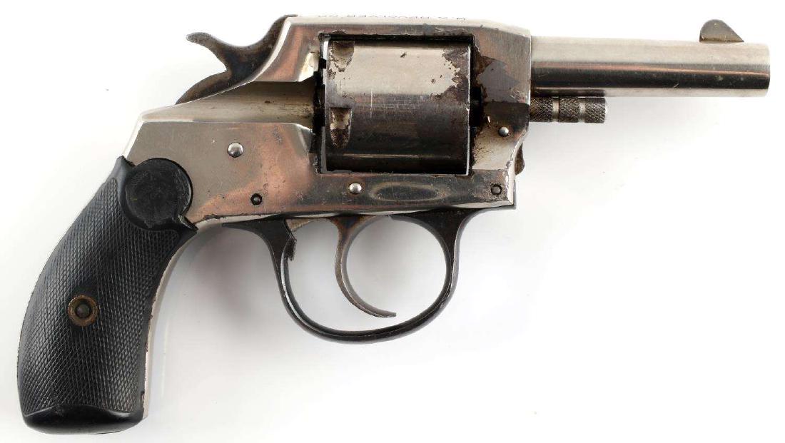 US REVOLVER 5 SHOT DA REVOLVER .32 CALIBER: Maker marked to top of frame, nickel finish with some loss, US bakelite grips, serial no. to trigger guard, half moon front sight, 2.5 inch barrel with good clear bore, action works, little play in cy