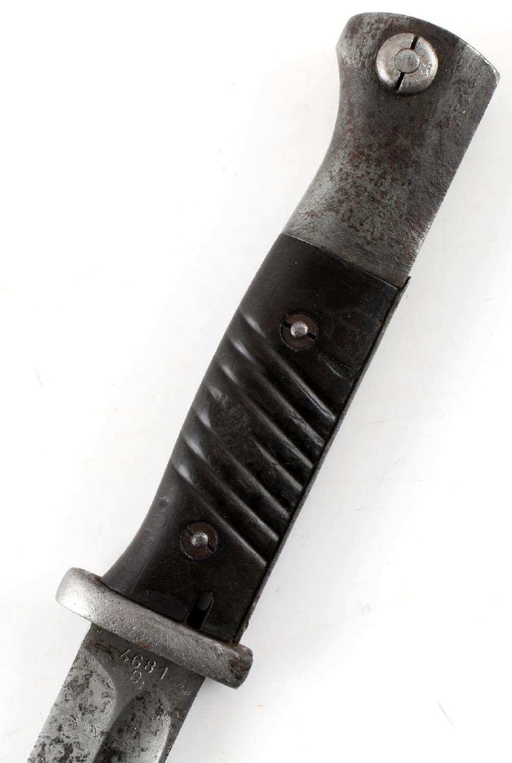 WWII GERMAN THIRD REICH KAR 98 MAUSER BAYONET: Field bayonet by Elite Diamant. Marked 44 sgx and 9380 ii on its scabbard. The ricasso is marked 4681. Good condition overall with some surface abrasions and pitting present.