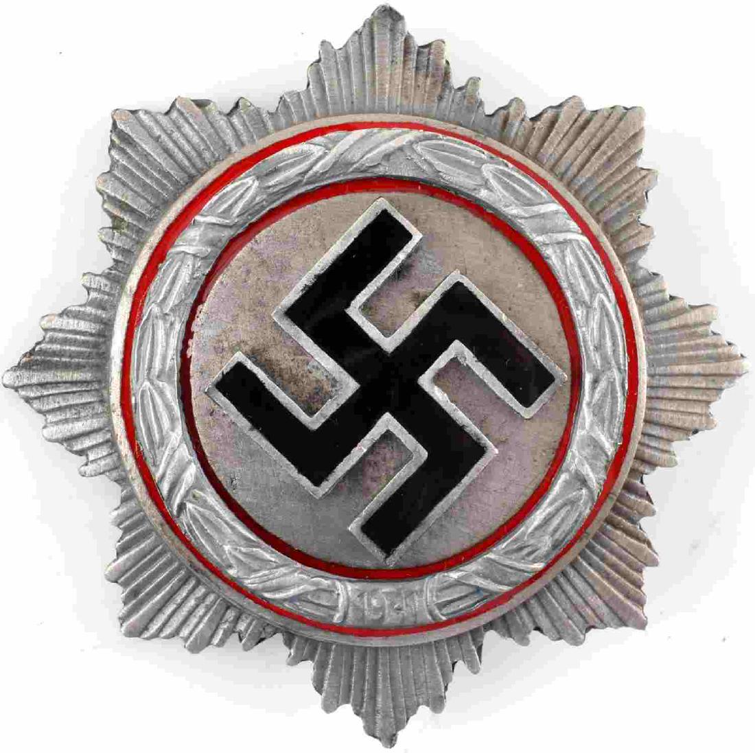 WWII THIRD REICH GERMAN CROSS SILVER AWARD: Silver German Cross medal. In very good condition. Bremmer maker mark on the back. Unauthenticated/Sold 'as is' This lot has a reserve.