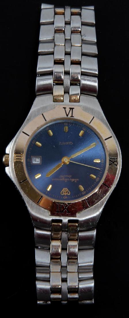 JULES JURGENSEN MODEL 7175 MENS WRIST WATCH: Jules Jürgensen men's watch model 7175. Base metal bevel and stainless steel back. Waterproof case. 25mm face. In very good used condition.