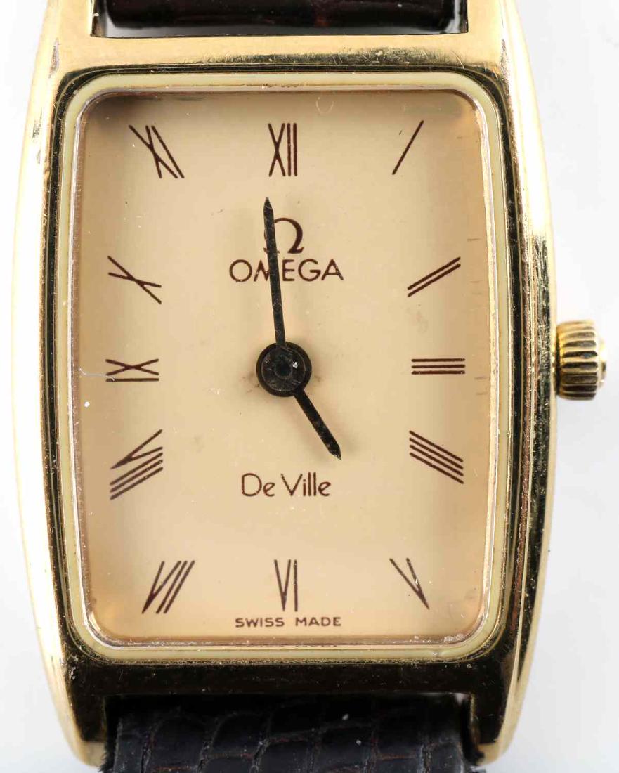OMEGA DE VILLE WOMENS QUARTZ WATCH: Womens Omega de Ville quartz watch. Rectangular face. Case is 20x12x4.5mm. Good condition. Leather of wristband is exhibiting some age.