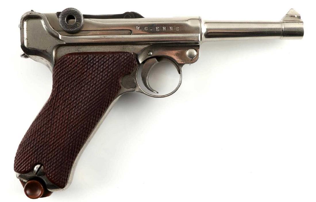 WWII GERMAN LUGER CHROME .30 CAL SEMI AUTO PISTOL: Chrome finish, proof marks all over, matching serial number all over, including in front and left side of frame, barrel measures just under 4 inches long with bright clean bore, checkered wood grips (