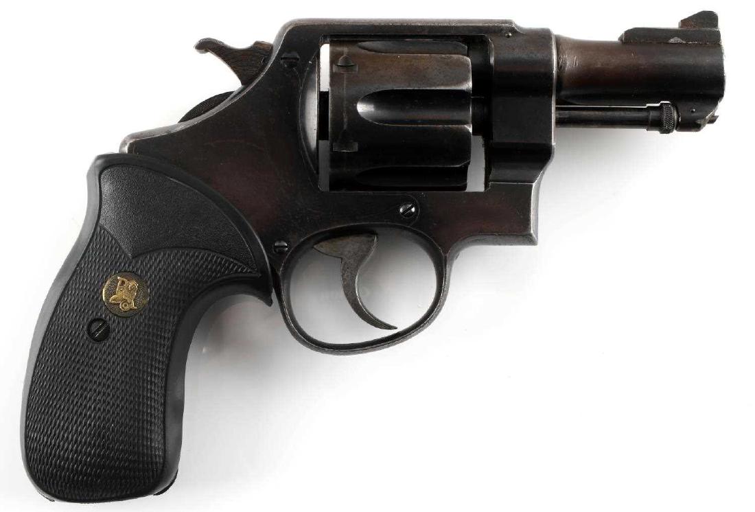SMITH & WESSON DA 6 SHOT REVOLVER IN .45 CALIBER: Blued steel with much wear and loss, 'S&W DA 45' marked to left side of 3 inch barrel, black rubber grips, missing butt piece, 1917 no. marked to bottom. Serial no. to frame interior. Number 8569 mark