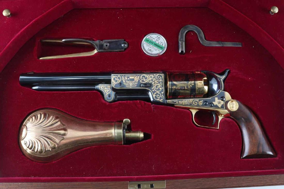 UBERTI COLT WALKER REPRO SAM HOUSTON .44 REVOLVER: Sam Houston edition, 1793-1863, Uberti copy of Colt Walker, black powder revolver. Gold work adorns gun with Sam Houston emblem on left side of grip, blued steel is near mint with small scratch to lef