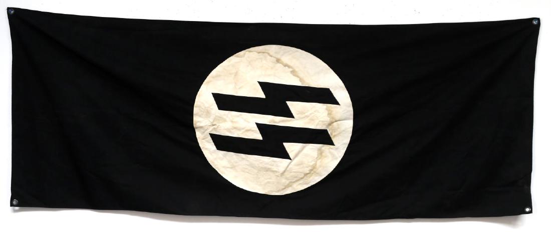 WWII GERMAN WAFFEN SS LARGE BARRACKS BANNER FLAG: This is a large 97" X 36" Waffen SS barracks banner. One sided, multi-piece construction with leather reinforcement panels and steel grommets. Very good condition overall with some slight staining and