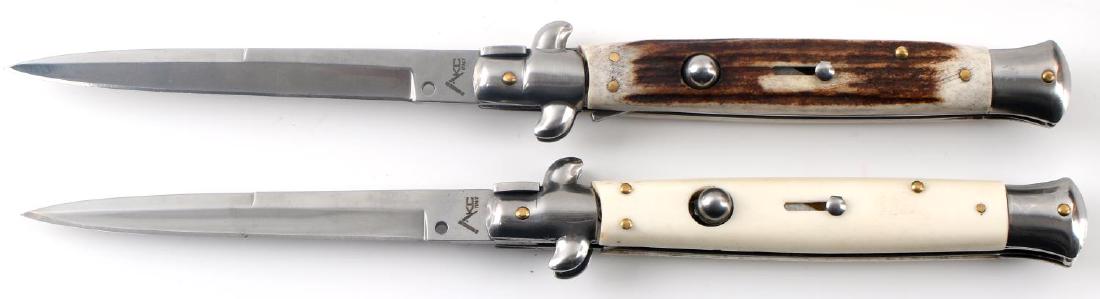 PAIR OF MARKED ITALIAN 6'' STILETTO POCKET KNIVES: Pair of 6 inch long blade Italian hand made Stiletto picklock switchblade knives with button mechanism, Stag horn / bone handle grips. Blades are both marked " AKC Italy" below the stiletto hole. This