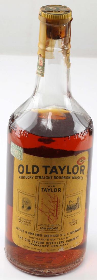 1944 SEALED FULL BOTTLE OF OLD TAYLOR BOURBON: Original Tennessee State tax seal intact, bottled 1944, above shoulder mellowing, very good original condition. We are unable to do in house shipping, either in store pick up or arrange outside shippi