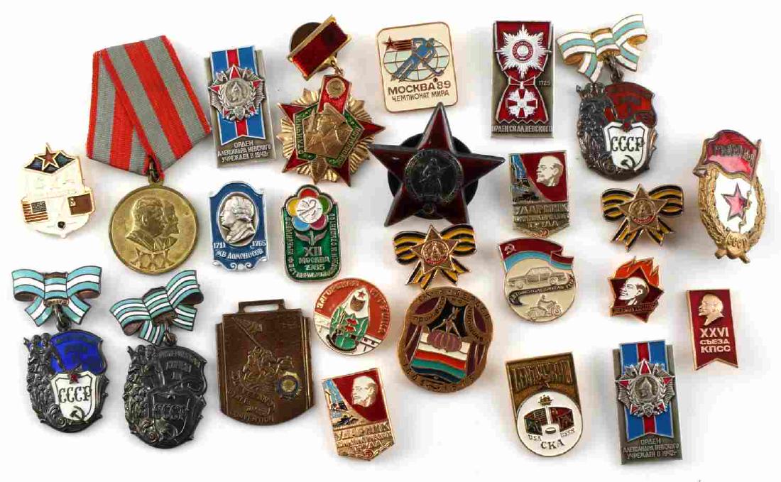 WWII USSR SOVIET UNION RED ARMY MEDAL BADGE LOT: Lot of about 25 badges and medals. Includes an Order of the Red Star badge with screwback with serial number 756948, a 30 year Jubilee Medal, Soviet Mothers badge, and several Cold War era sports and 