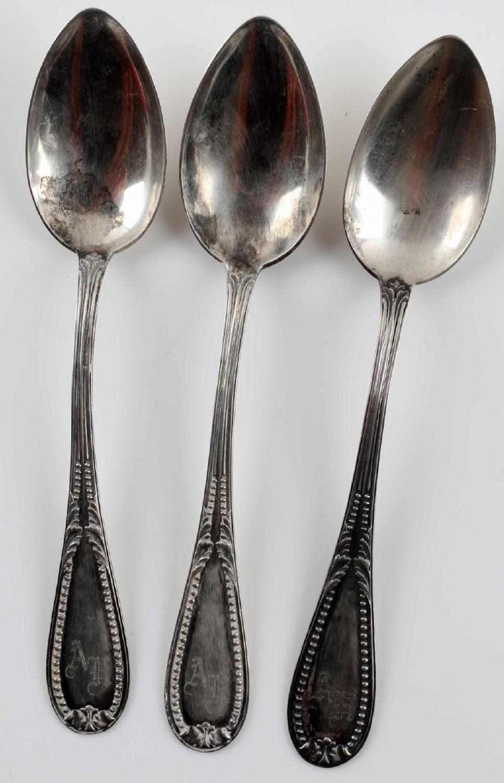 3 WWII GERMAN ADOLF HITLER MONOGRAMMED 800 SPOONS: THREE (3) pieces of Adolf Hitler's silverware. Teaspoons are made of 800 silver and maker's marked. Each measures 5.75 inches. All in good condition with some expected tarnish and age wear. Unauthenti