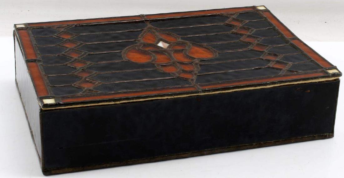 AMBER COLORED STAINED GLASS LID TRINKET BOX: Trinket box with a stained glass top. Design has black and amber colored glass segments. Measures 12 x 8 1/2 x 3 inches. In very good condition.