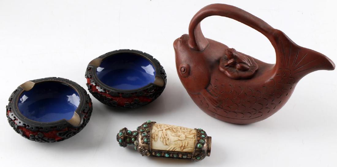 LOT CHINESE ITEMS CINNABAR ASHTRAY SNUFF: One Yixing clay teapot in the shape of a fish. Lid has a frog on lily pad. Measures approximately 8 inches by 2.5 inches by 6 inches. Inscription in Chinese characters on bottom. In good condition. On