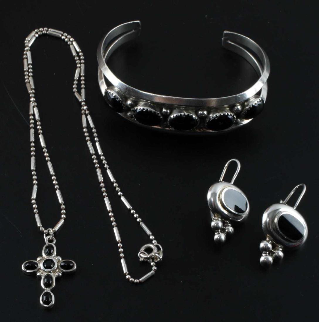 925 STERLING ONYX NECKLACE BRACELET & EARRING SET: Sterling Silver Onyx Necklace, bracelet, and earring set marked 92 signed "N.S.C". Items are in very good condition for their vintage to antique age and have been cleaned. Total weight 36 grams.