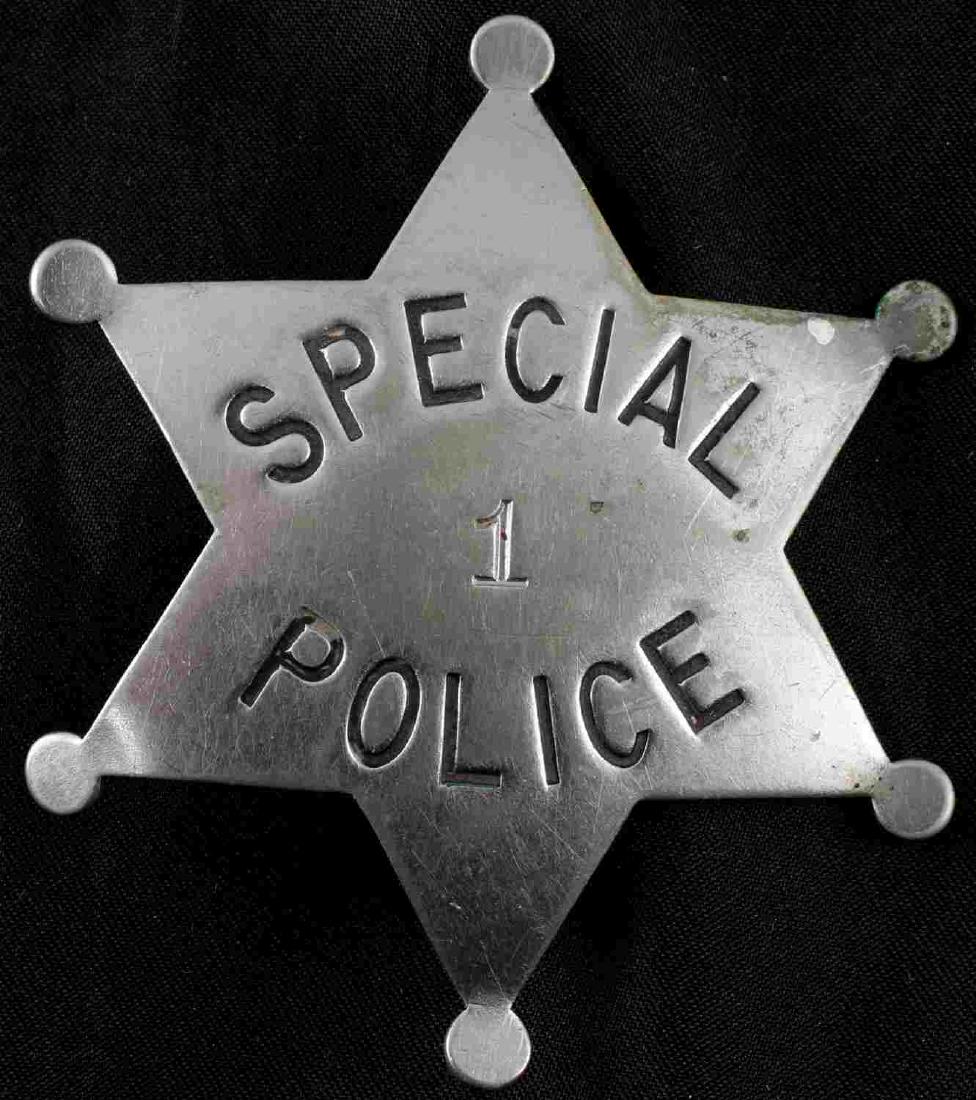 6 POINT STAR SPECIAL POLICE BADGE NUMBER 1 BURNSID: Maker stamped Art Burnside police equipment, very good original condition, measuring 60 mm. This lot has a reserve.