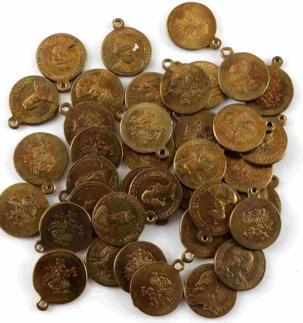 IMPERIAL RUSSIA TSAR ORDER MEDAL LOT OF 38: This lot includes 38 Imperial Russian Tsar medals. Medals depict Peter the Great, Ivan the Terrible, Nikolas II, and more. All feature Russian eagle on reverse. Very good overall. Some abrasions and d